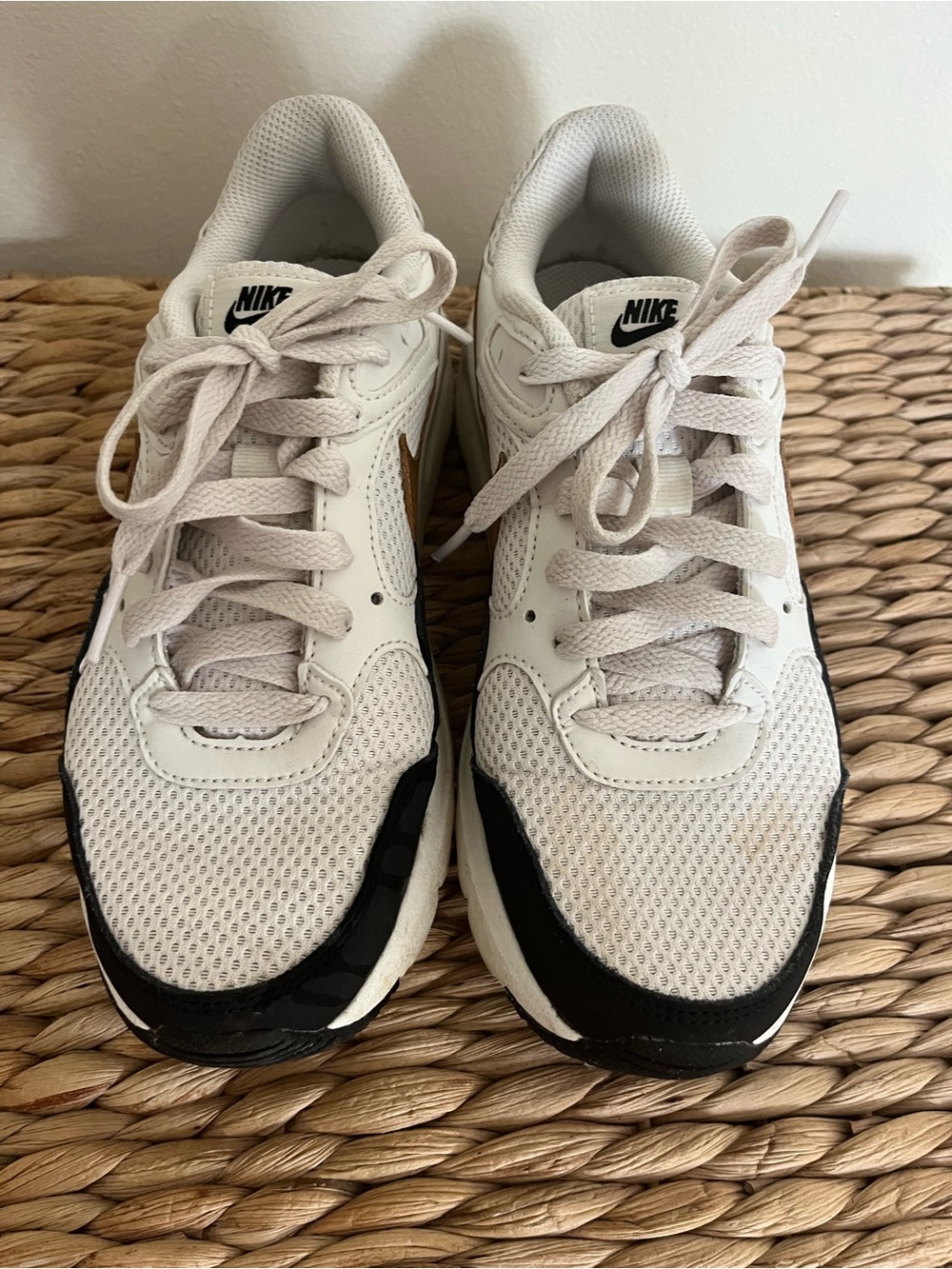 Nike White and Black Running Sneakers with Gold Swoosh